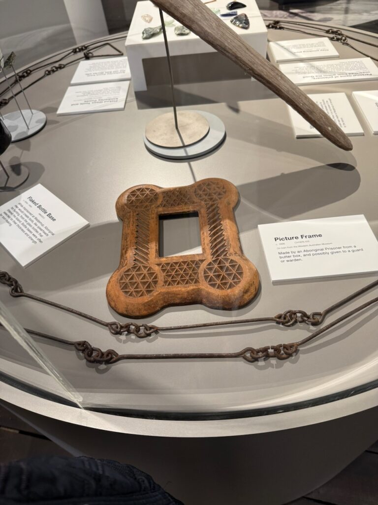 At the museum, "Picture Frame c. 1898 CH1976.103 On loan from the Western Australian Museum Made by an Aboriginal Prisoner from a butter box, and possibly given to a guard or warden."