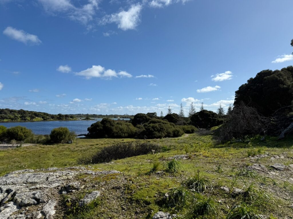 View across from the Settlement of Garden Lake, a permanent salt lake just behind the town, with the natural limestone visible in the foreground
